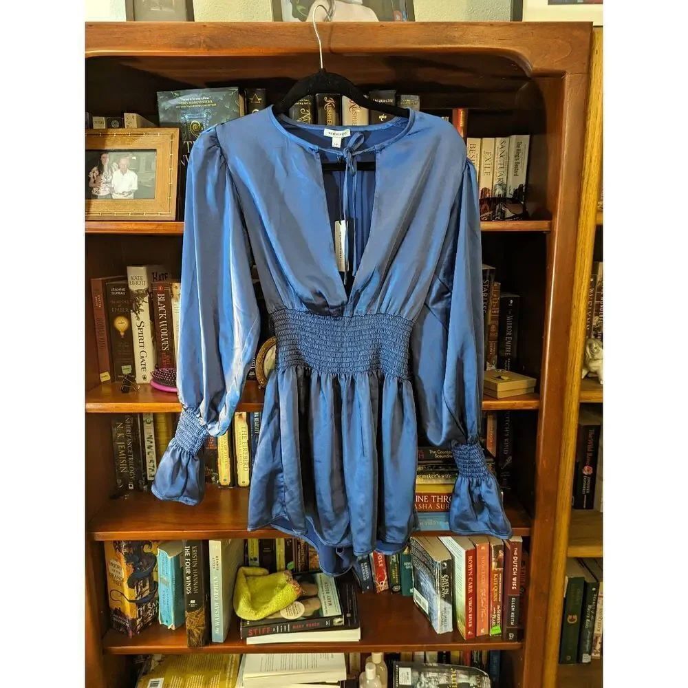 We wore what smocked sleeve satin romper sz small new with tags